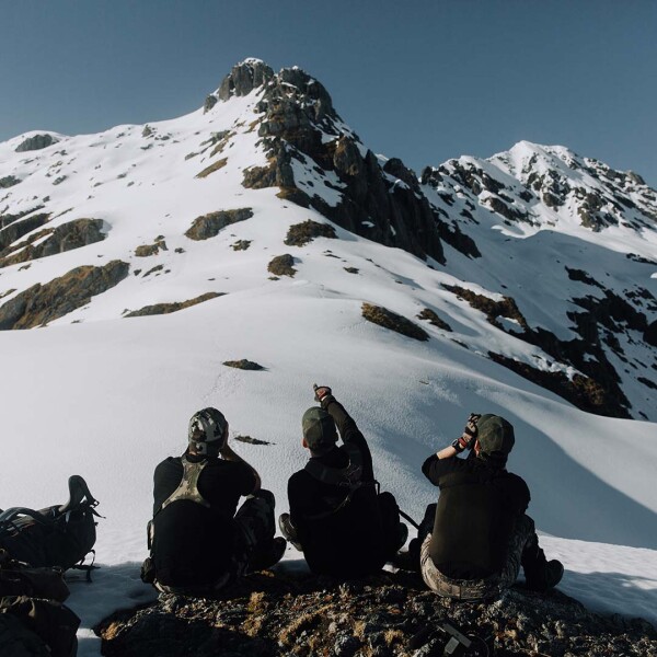 Alpine hunters preparing a climb