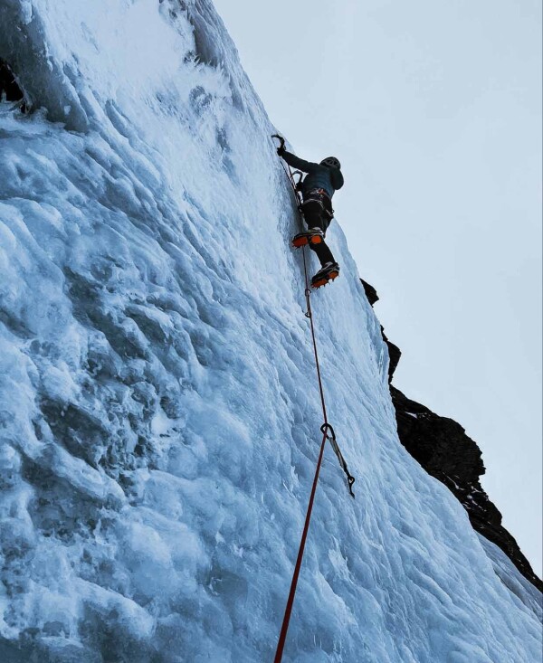 A climber undertaking a similar route to Samuel at the Touchdown slabs area.